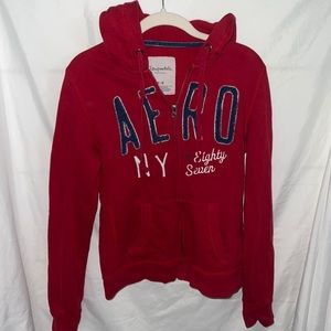 Aéropastel red hoodie